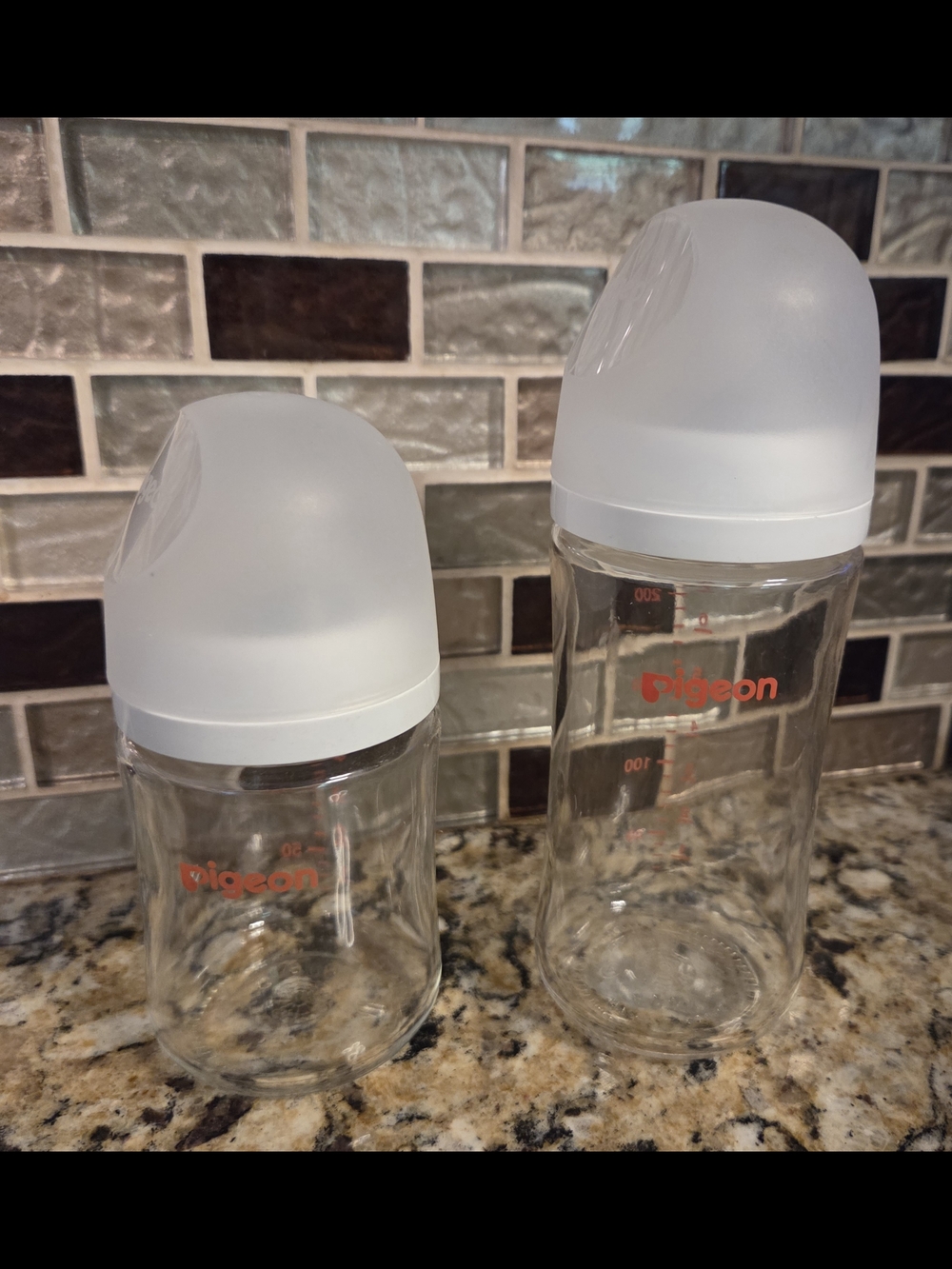 2 EUC Pigeon Glass Baby Bottles with White Caps and Orange Logo (2-Pack)